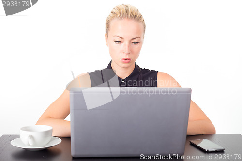 Image of Business woman in office.