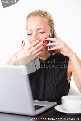 Image of Business woman yawning.