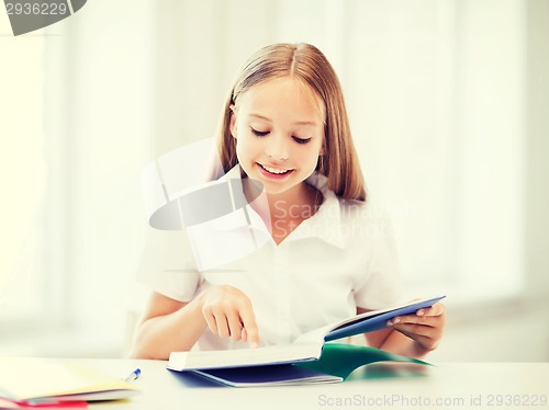 Image of student girl studying at school