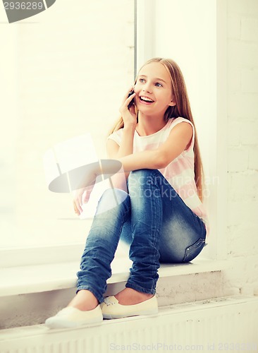 Image of girl with smartphone at school