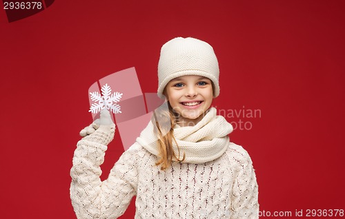 Image of girl with big snowflake