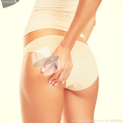 Image of woman in cotton underwear showing slimming concept