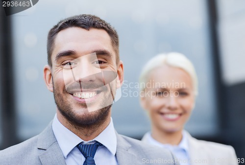 Image of close up of smiling businessmen