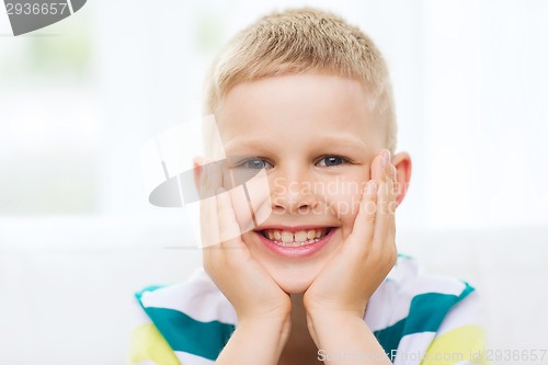 Image of smiling little boy at home