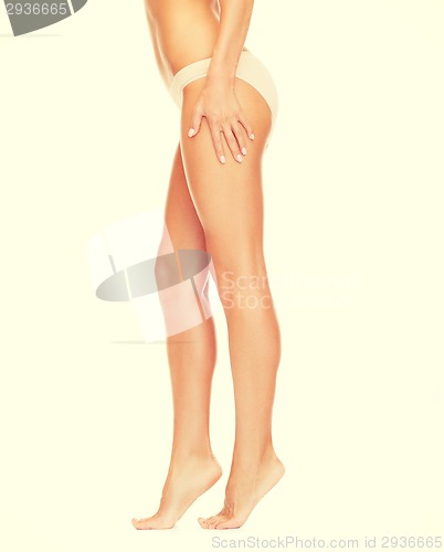 Image of woman with long legs in cotton underwear