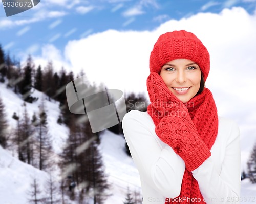 Image of smiling young woman in winter clothes