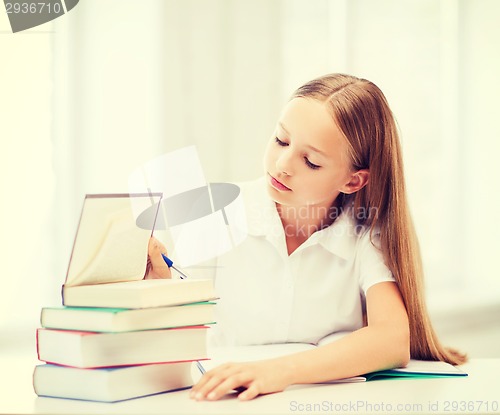 Image of student girl studying at school