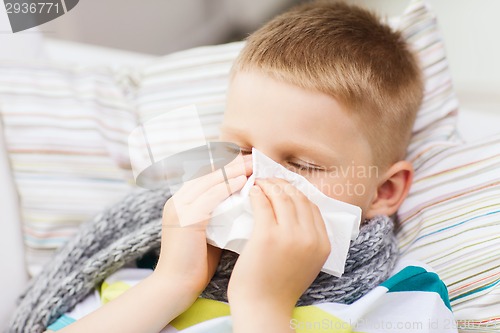 Image of ill boy with flu at home