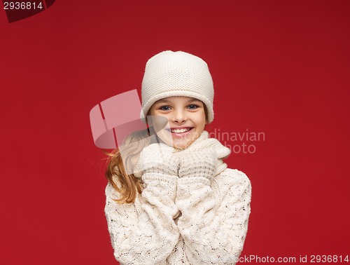 Image of girl in hat, muffler and gloves