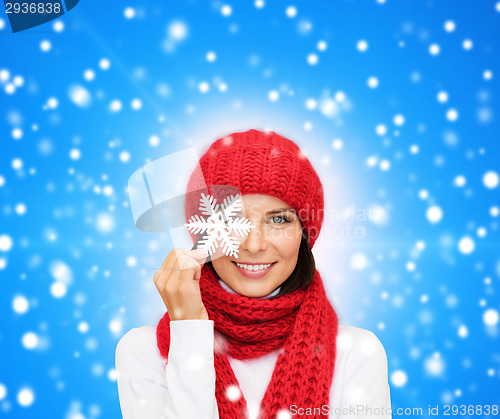 Image of smiling young woman in winter clothes