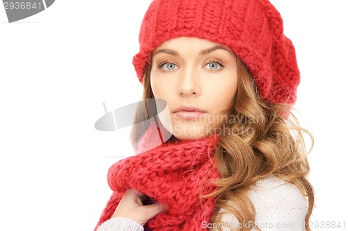 Image of close up of smiling young woman in winter clothes