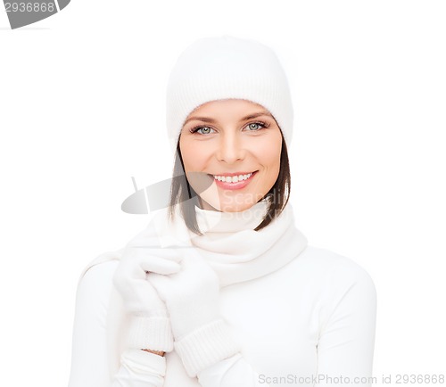 Image of woman in hat, muffler and gloves
