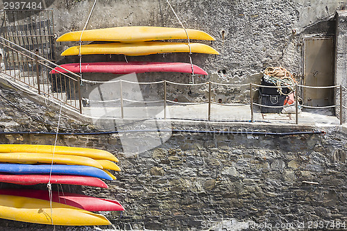 Image of Plastic canoes, hanging on the wall