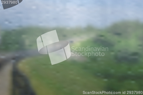 Image of Landscape through wet window