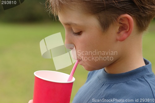 Image of Child drinking through a straw