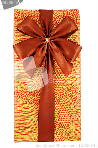 Image of beautifully decorated gift box with bow on white