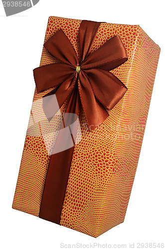 Image of beautifully decorated gift box with bow over white