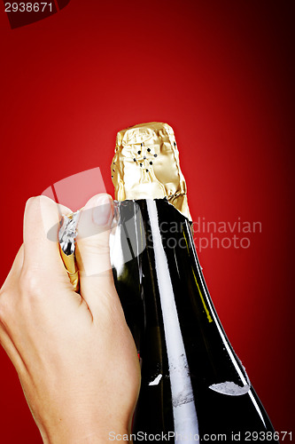 Image of Opening champagne bottle