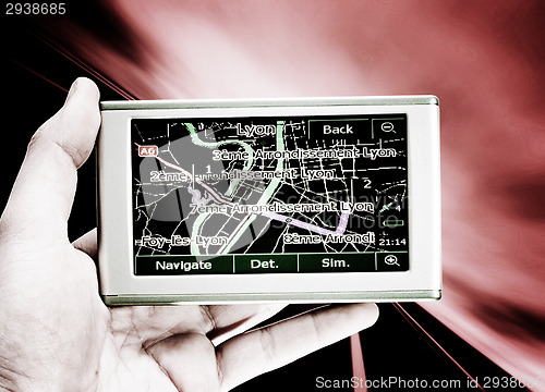 Image of GPS Vehicle navigation system in a man hand.