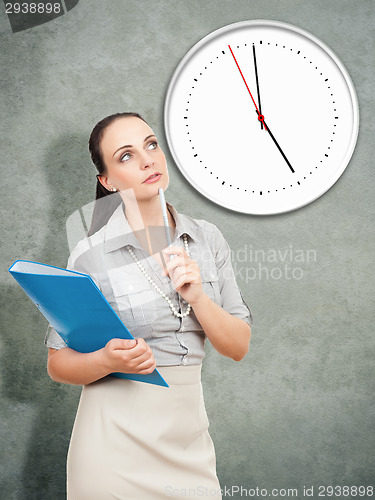 Image of business woman with a blue folder