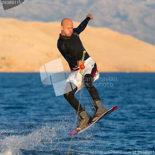 Image of Wakeboarder in sunset.