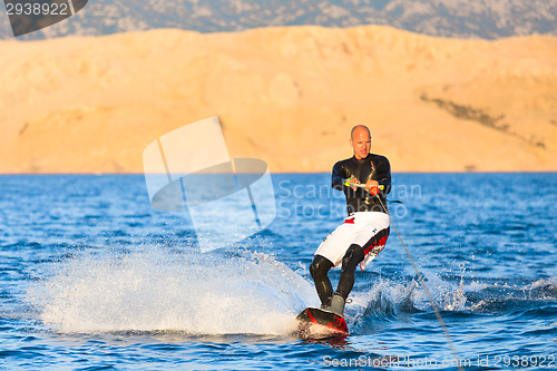 Image of Wakeboarder in sunset.