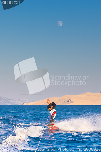 Image of Wakeboarder in sunset.