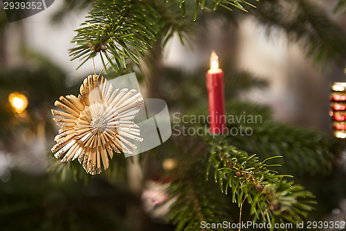 Image of Straw stars on a christmas tree