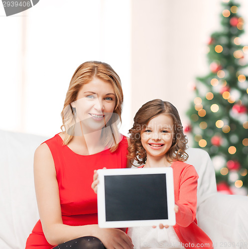 Image of mother and daughter with tablet pc