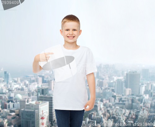 Image of smiling little boy in white blank t-shirt