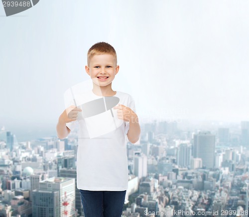 Image of smiling little boy in white blank t-shirt