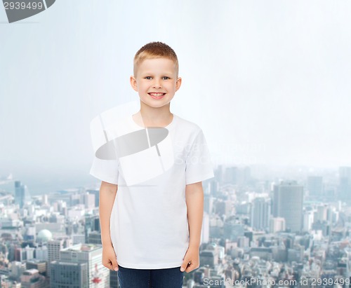 Image of smiling little boy in white blank t-shirt