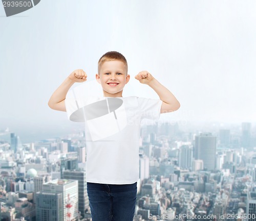 Image of smiling little boy in white blank t-shirt