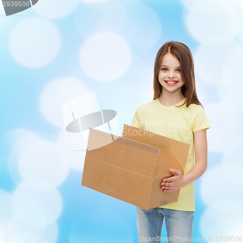 Image of smiling little girl in white blank t-shirt