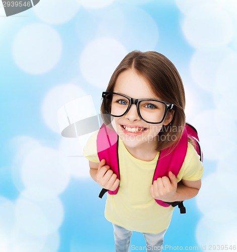 Image of happy smiling teenage girl in eyeglasses with bag