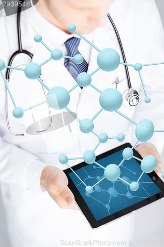 Image of close up of doctor with stethoscope and tablet pc