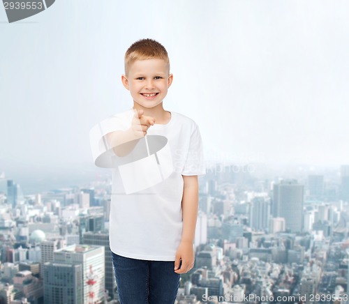 Image of smiling little boy in white blank t-shirt