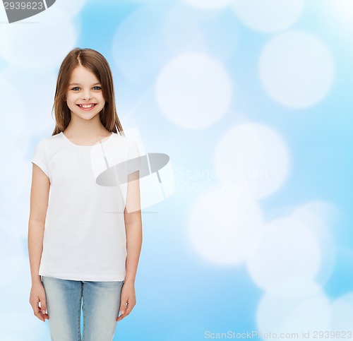 Image of smiling little girl in white blank t-shirt