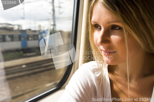 Image of young woman in vintage train