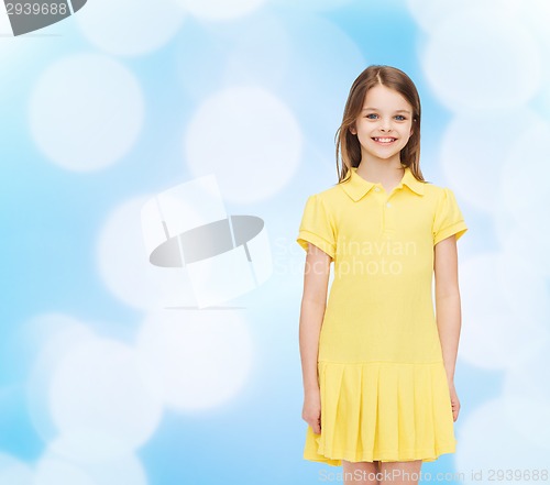 Image of smiling little girl in yellow dress