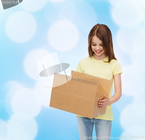 Image of smiling little girl in white blank t-shirt