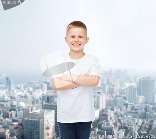 Image of smiling little boy in white blank t-shirt