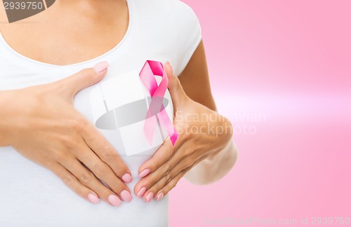 Image of woman with pink cancer awareness ribbon