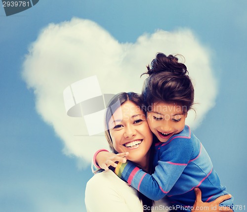 Image of hugging mother and daughter