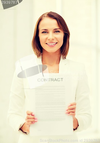 Image of businesswoman holding contract