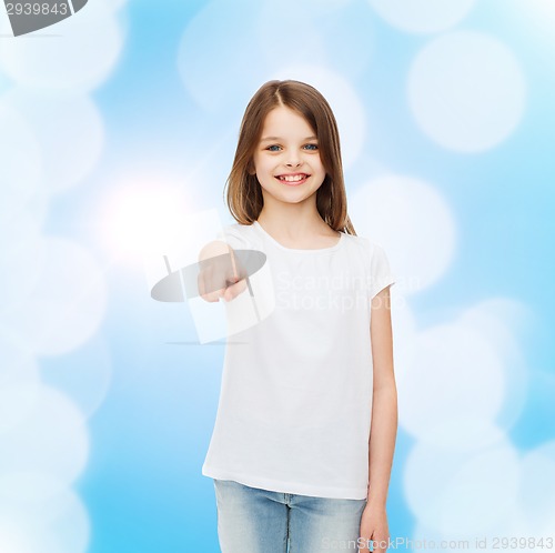 Image of smiling little girl in white blank t-shirt