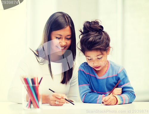 Image of mother and daughter drawing