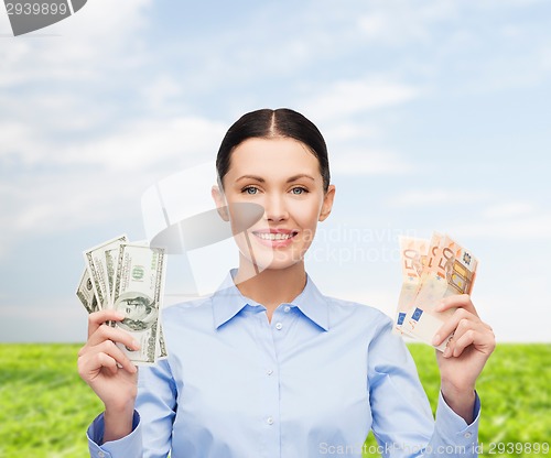 Image of businesswoman with dollar cash money