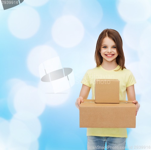 Image of smiling little girl in white blank t-shirt