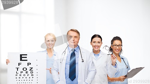 Image of smiling eye doctors and nurses